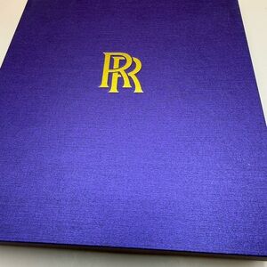 Purple Gift Box with Gold Rolls Royce Logo, inside a gift of a day timer & pen